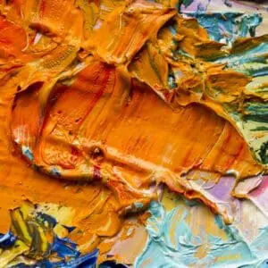 Colorful abstract oil paint texture close-up.