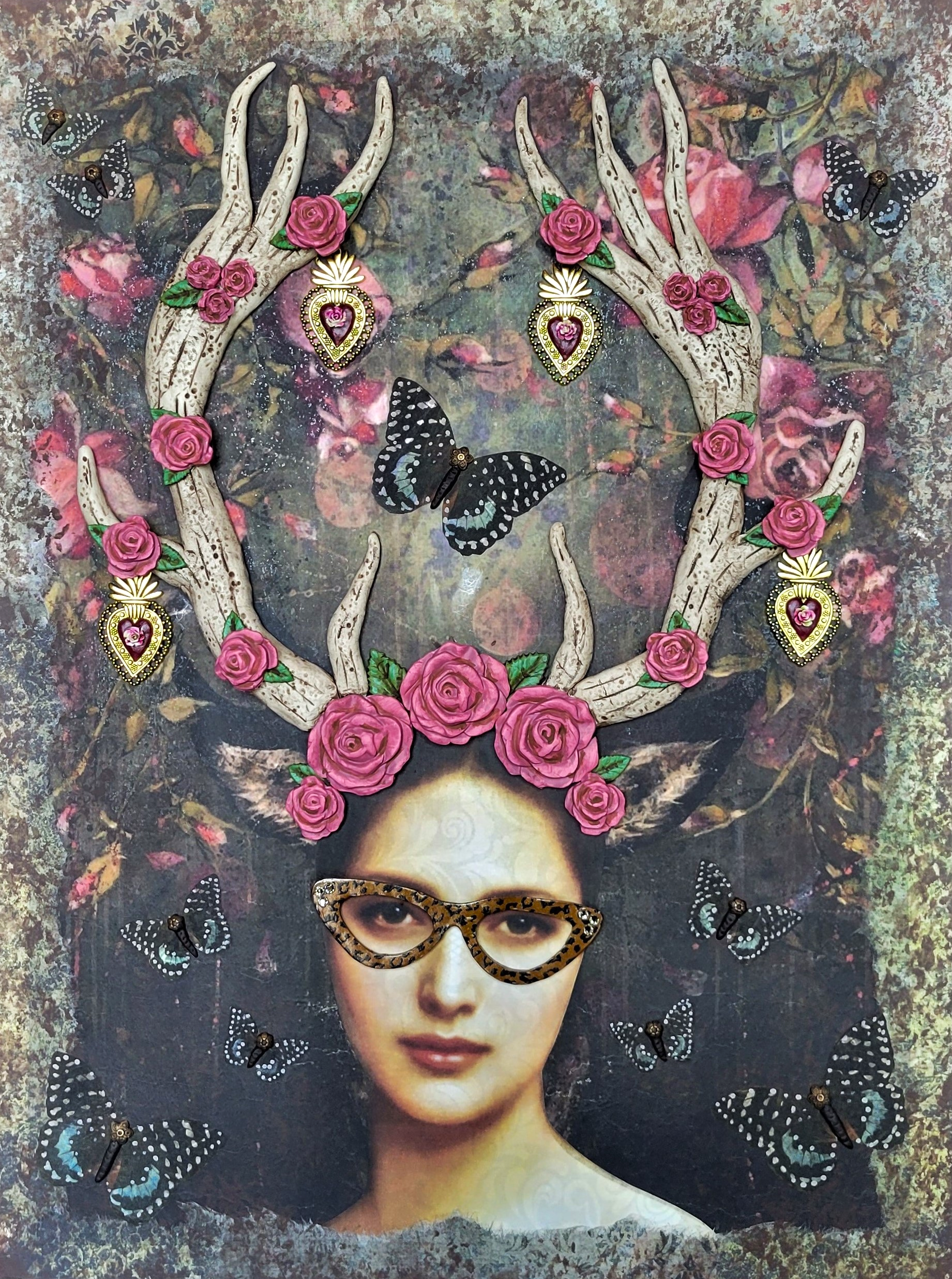 Stag-gering Thoughts of Love A woman with glasses and antlers on her head.